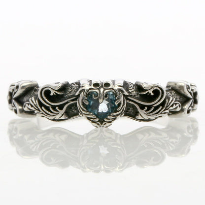 Ring : Narrow Scroll Heart w/Blue Topaz