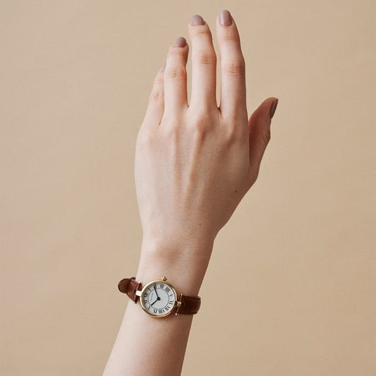 AURA ROUND GOLD BROWN LEATHER
